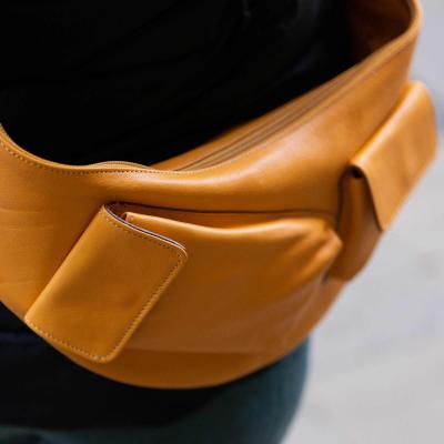 Leather fanny pack with compartments