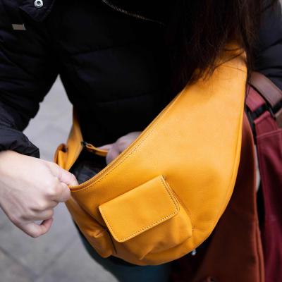 Leather fanny pack with compartments