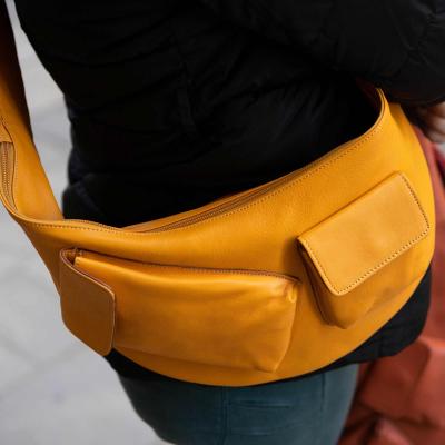 Leather fanny pack with compartments